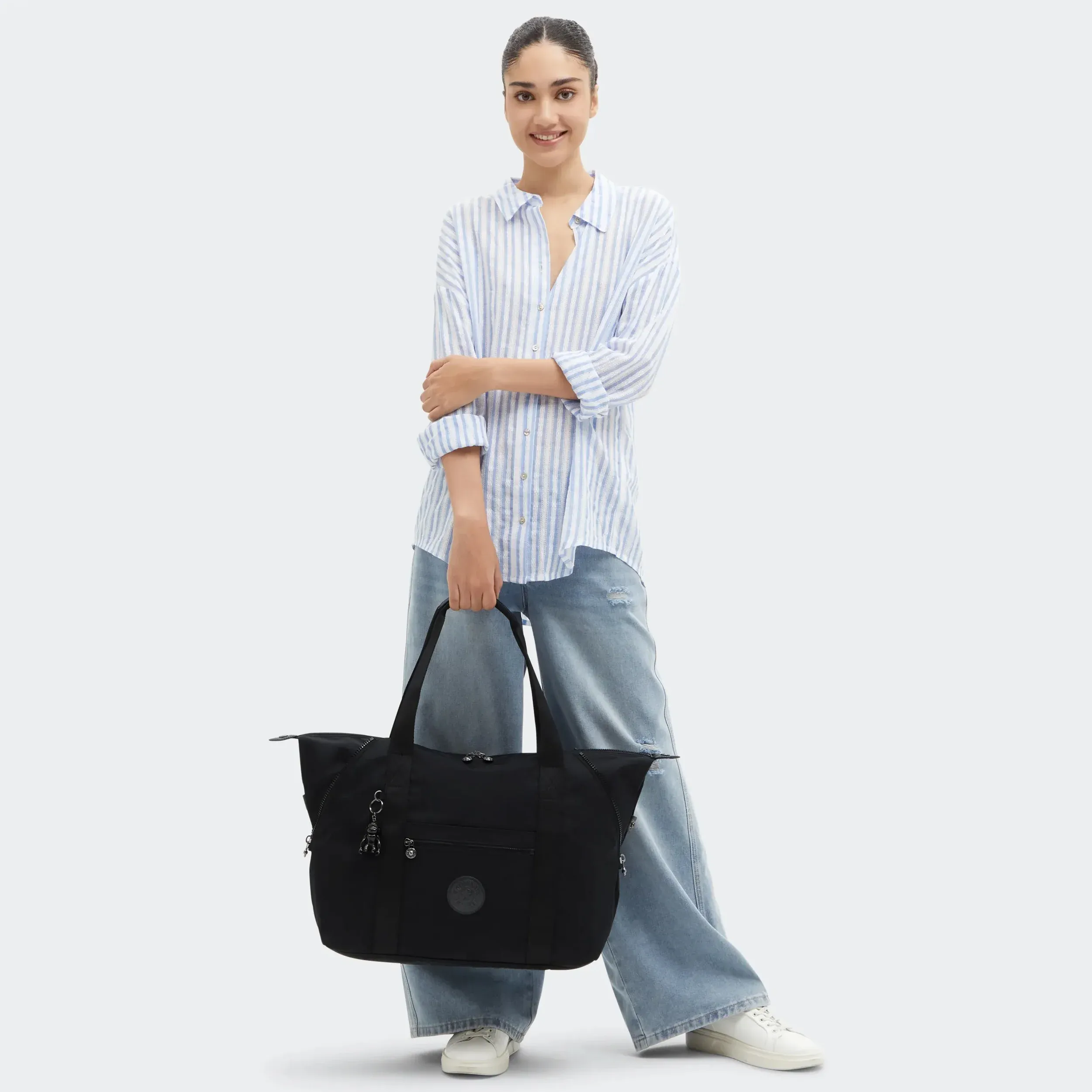 Konstmedium-tas