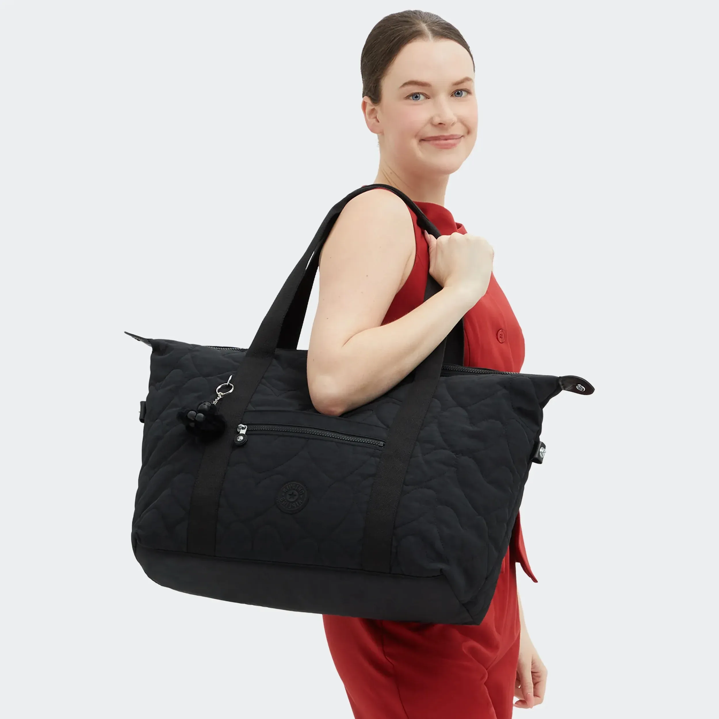 Konstmedium-tas