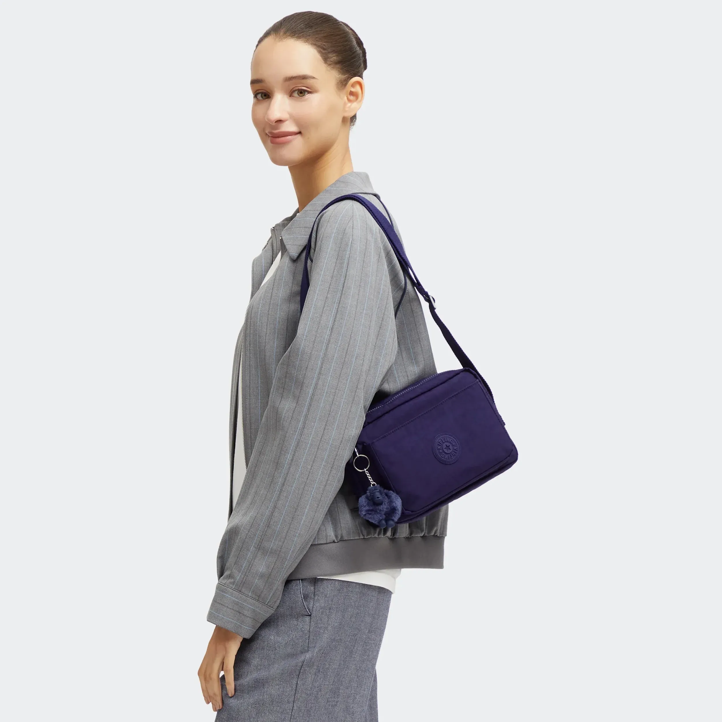 Abanu Medium-bag i korsryggsformat