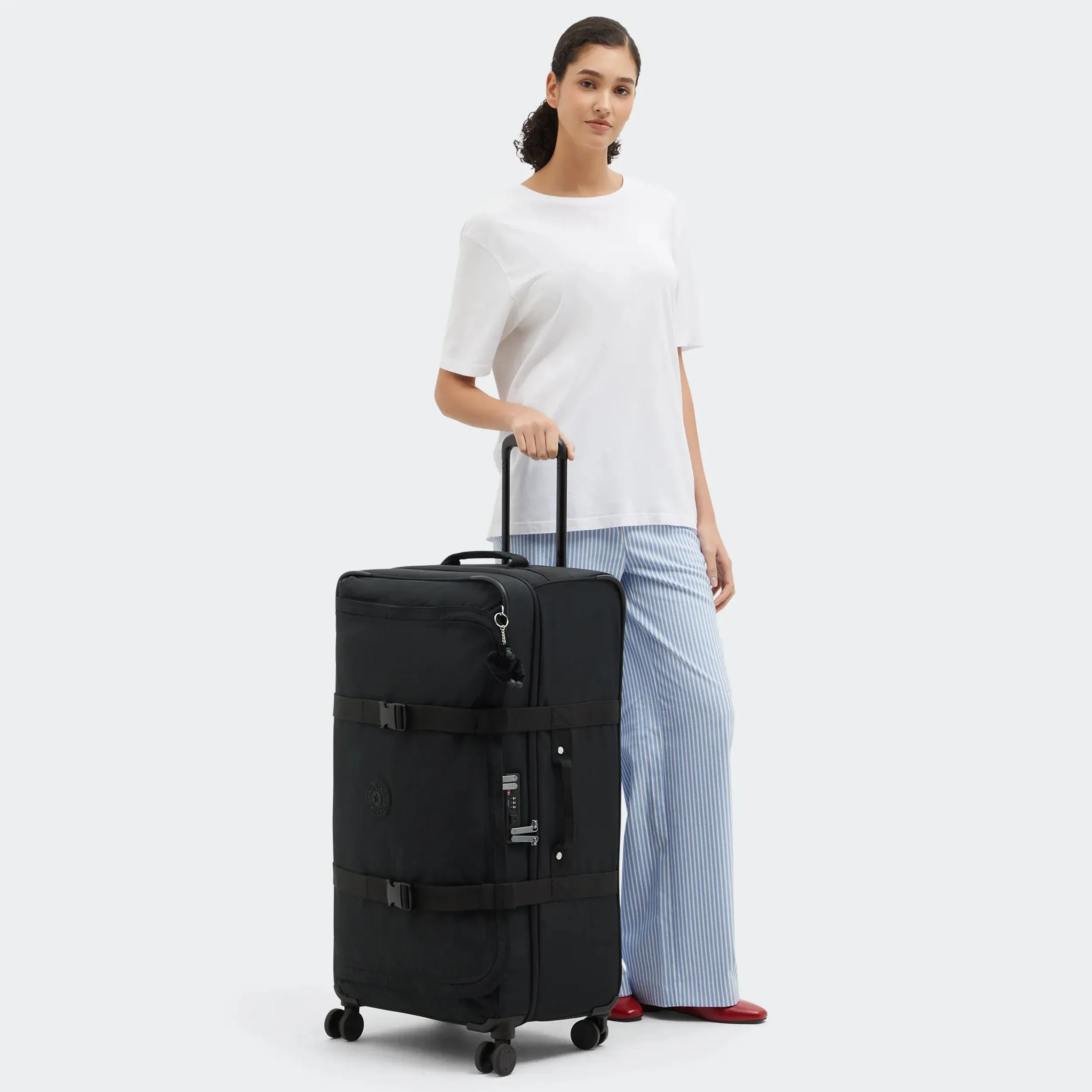 Spontan stor rullande bagage